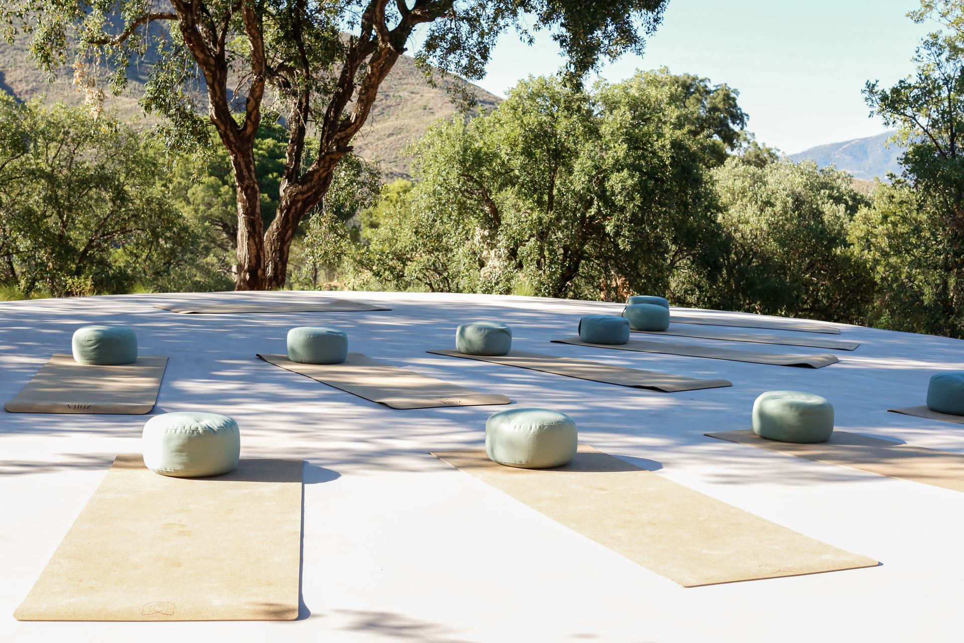 The yoga deck at Viluz, where the same brass fixture works indoors and out The yoga deck at Viluz, where the same brass fixture works indoors and out